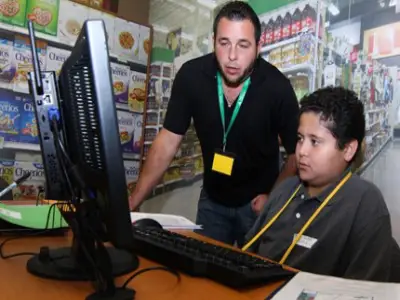 image of a ja volunteer and student